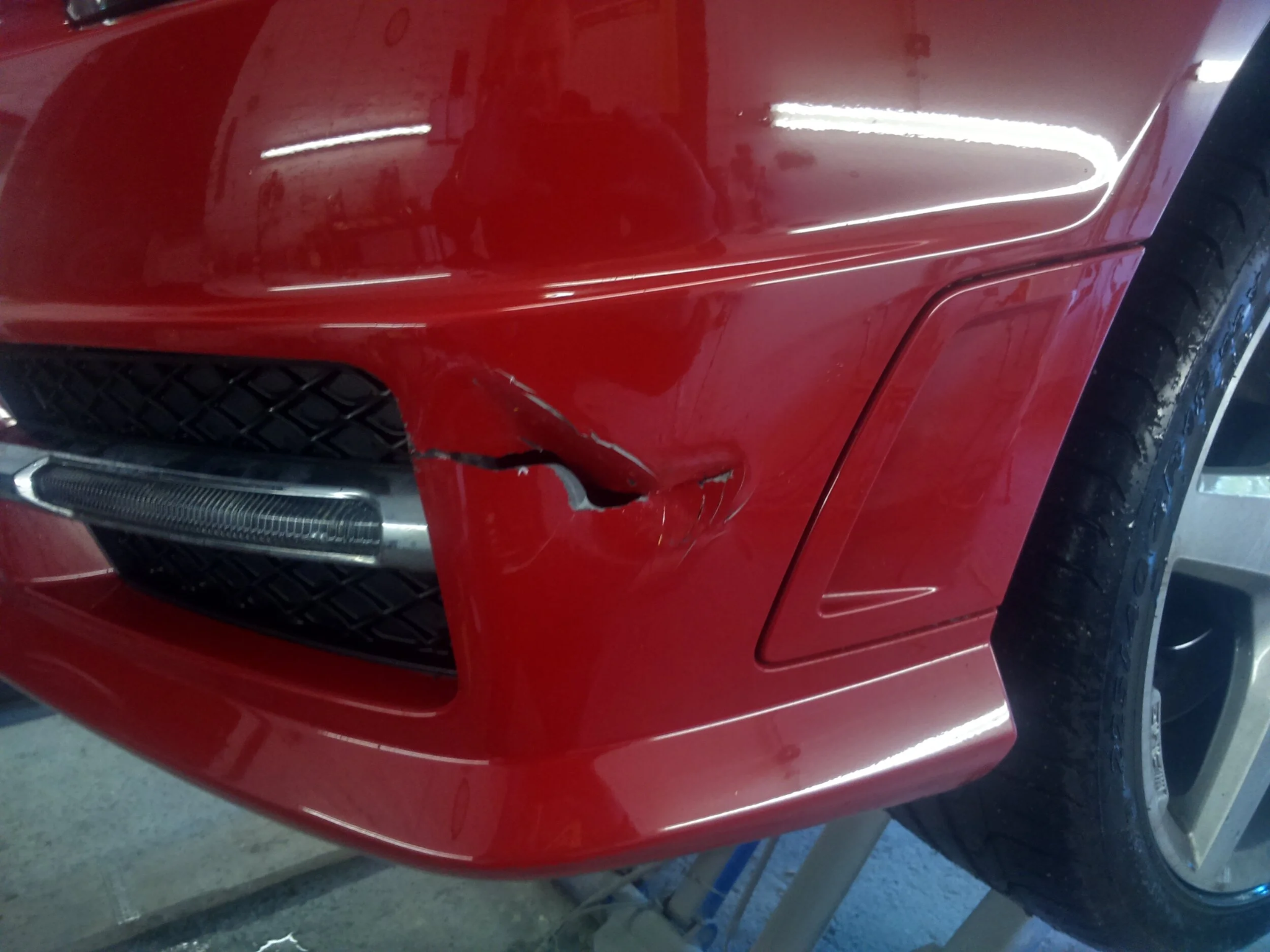 Red bumper before repair